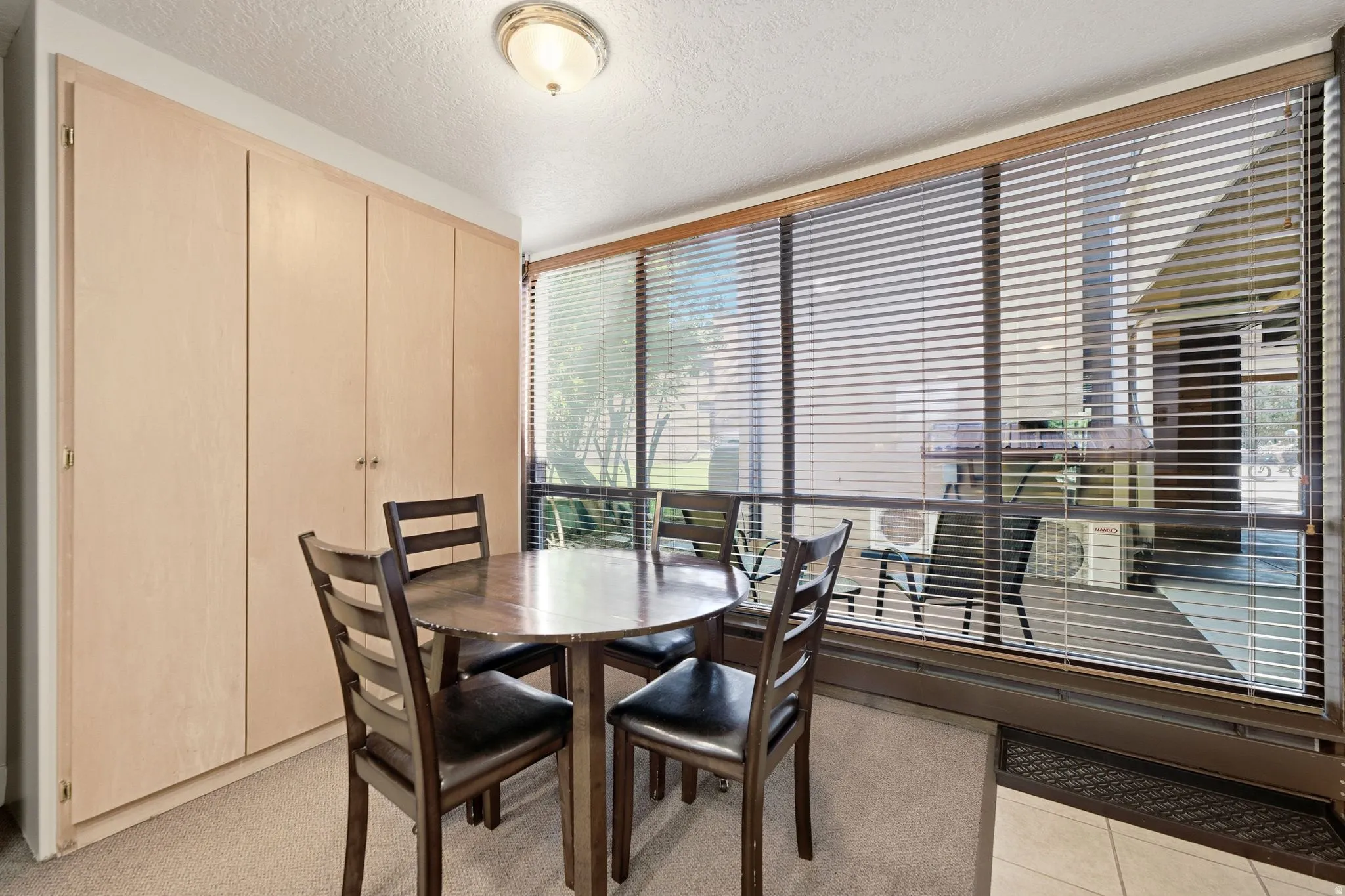Full-height built-in cabinetry provides ample storage