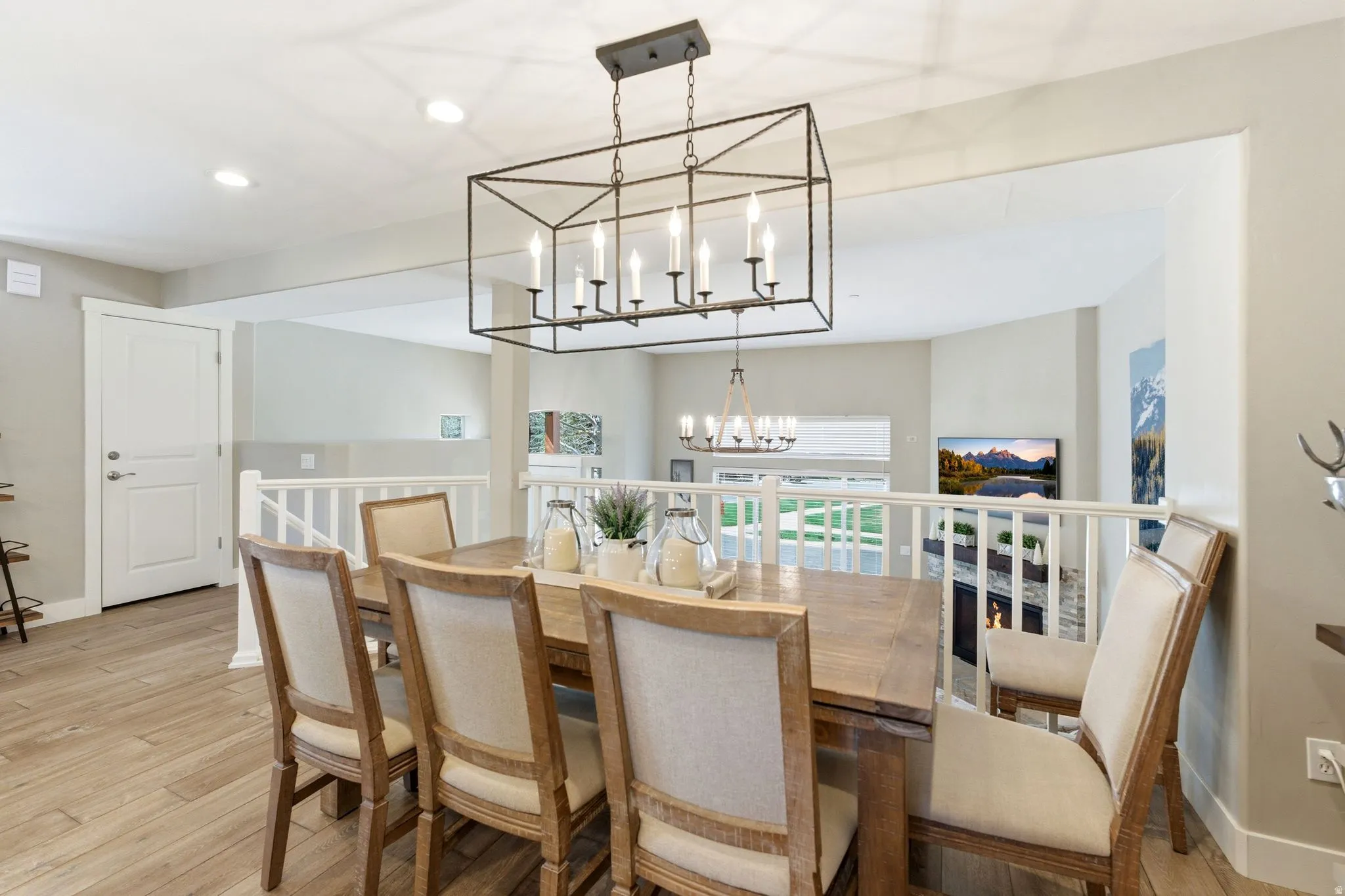 Dining room with a chandelier and light wood-type flooring