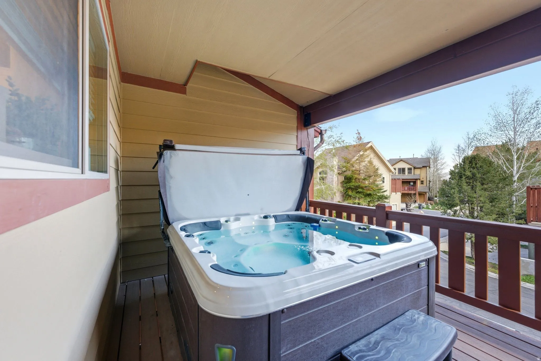 Balcony featuring a hot tub