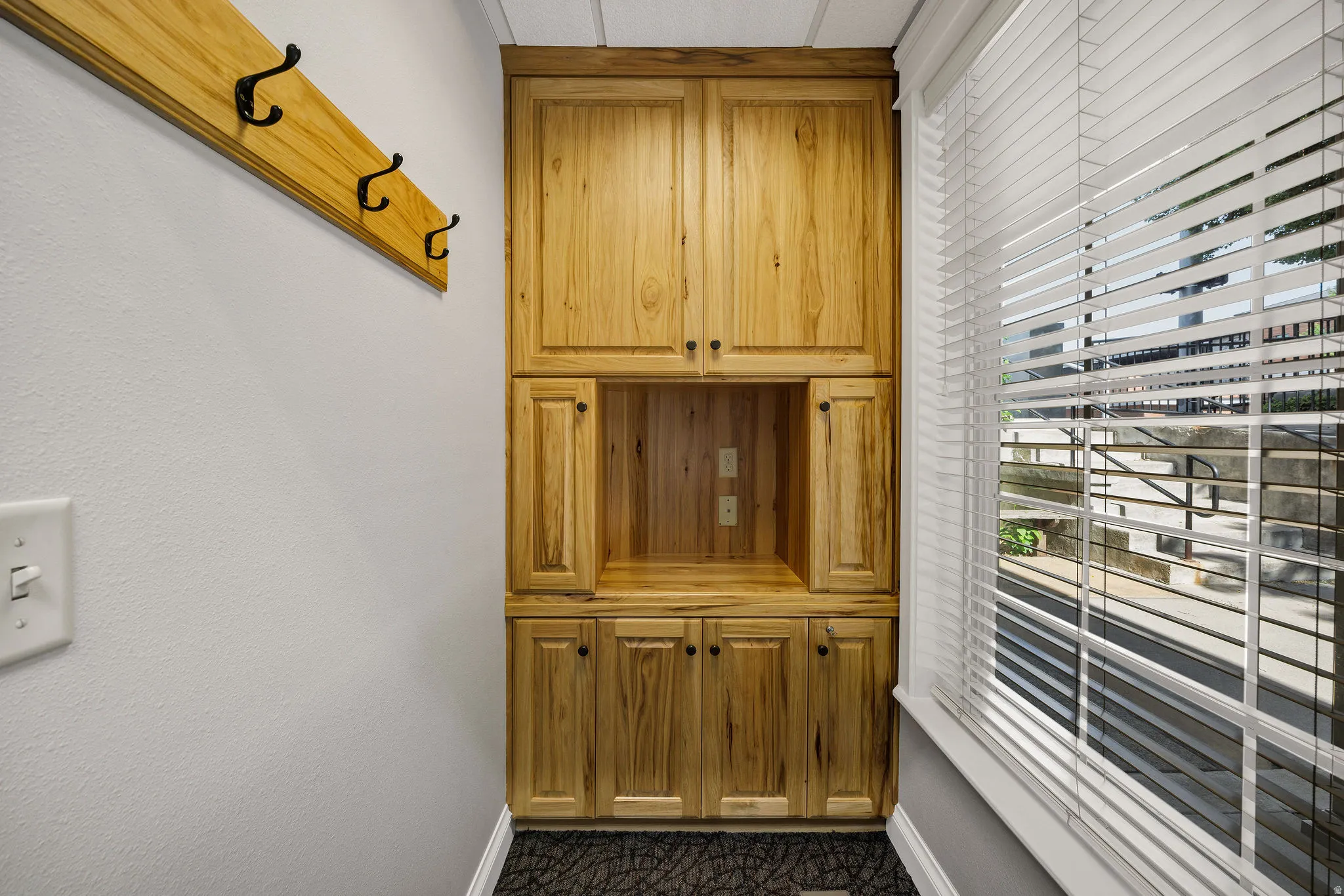 Reception area featuring a tv area and storage