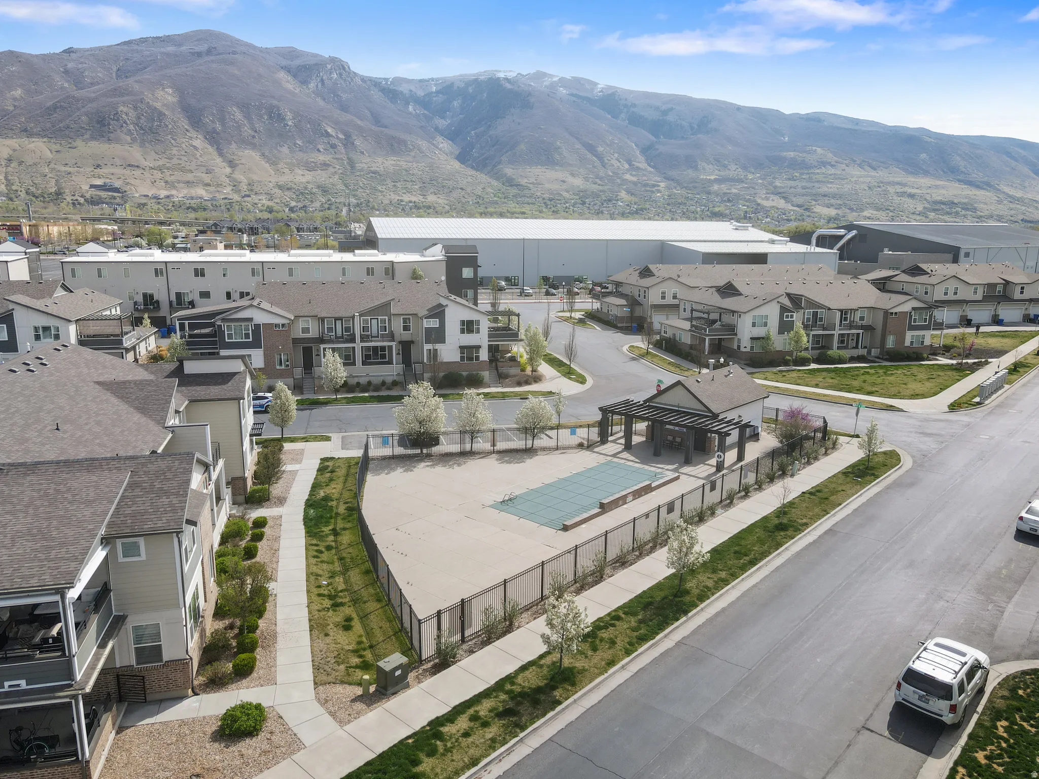 Aerial perspective of suburban area featuring mountains