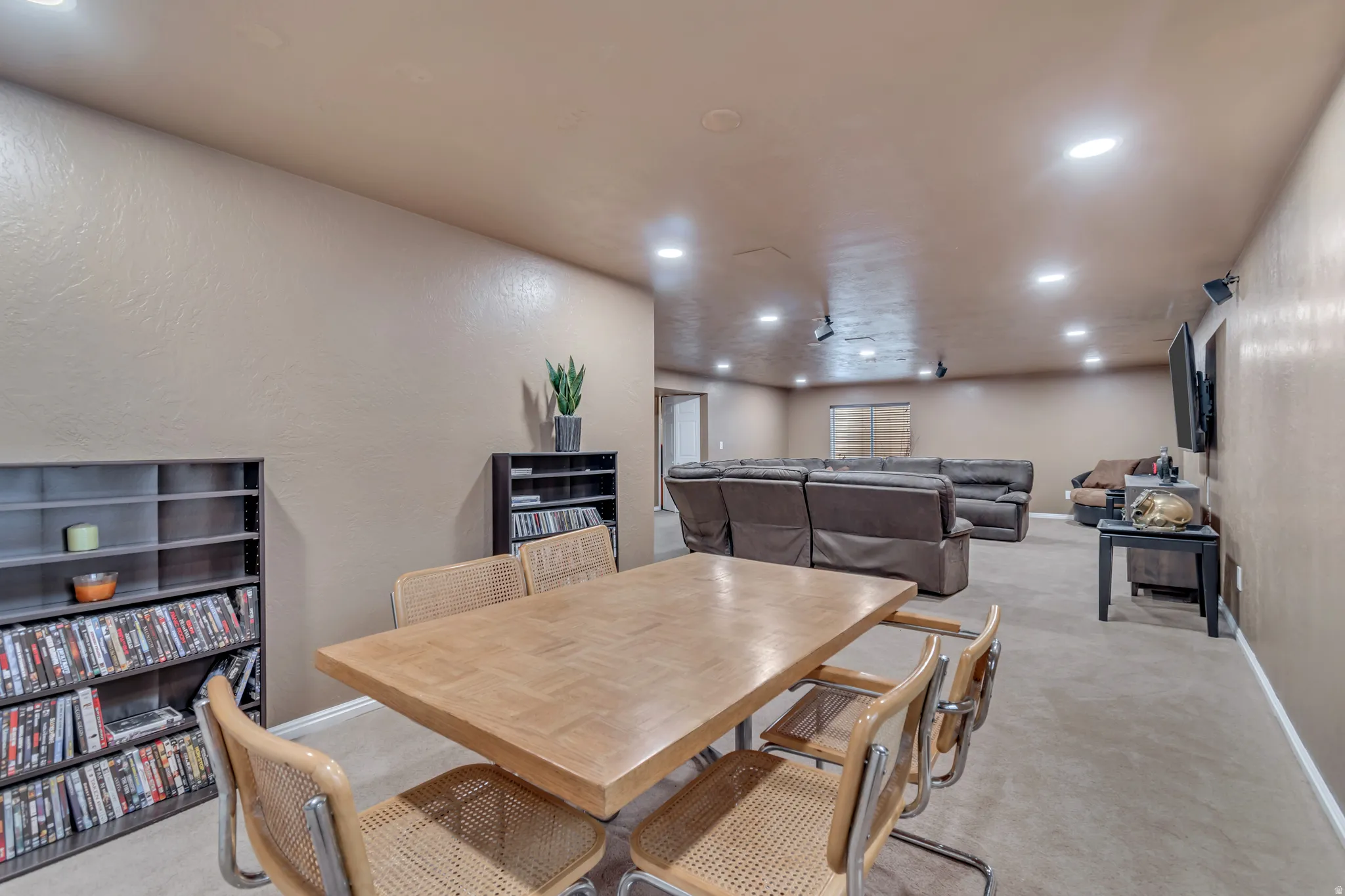 Quiet place game room with a long-view of the large family room.