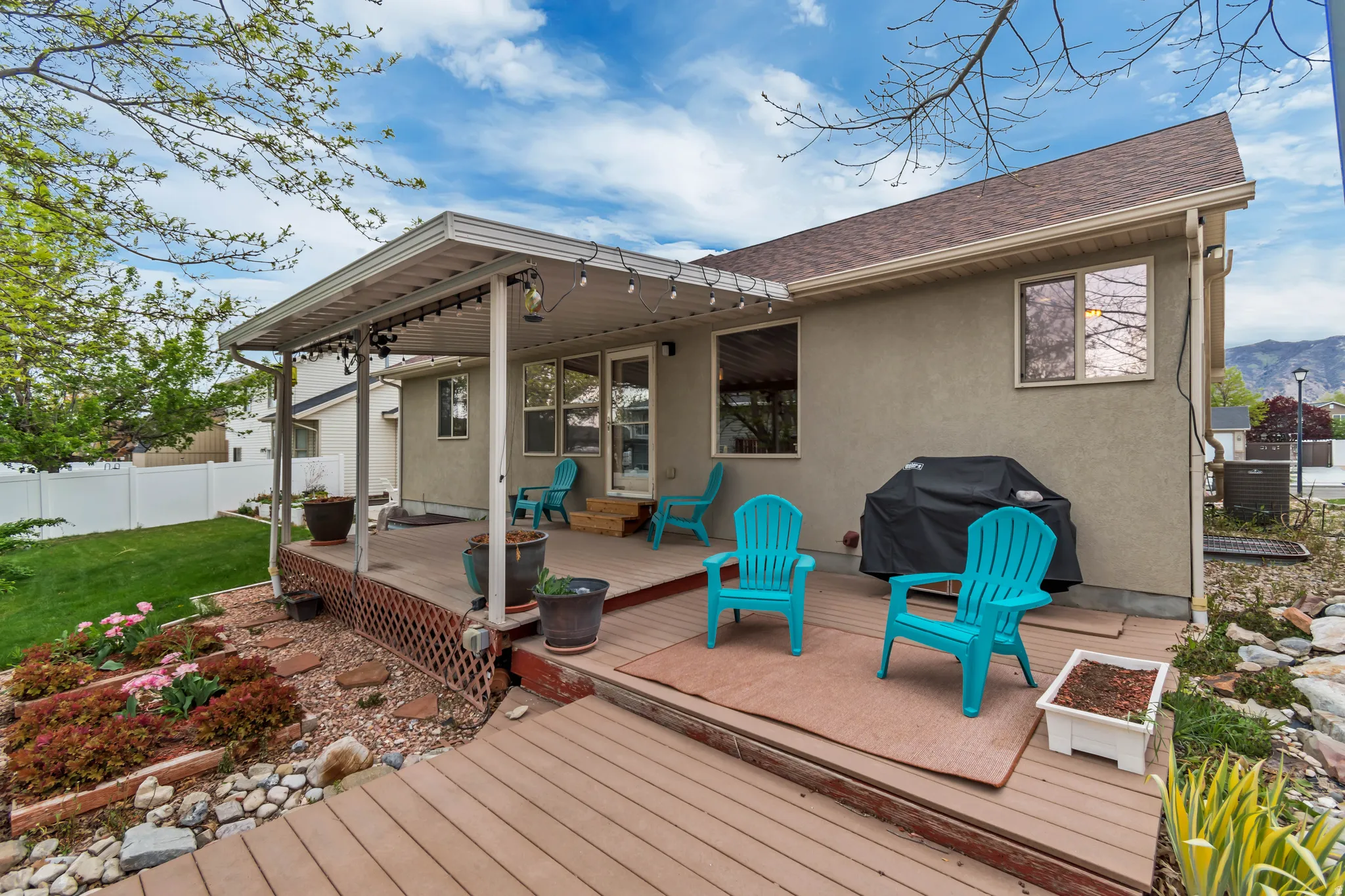 Expansive three-tiered Trex-decking patio.