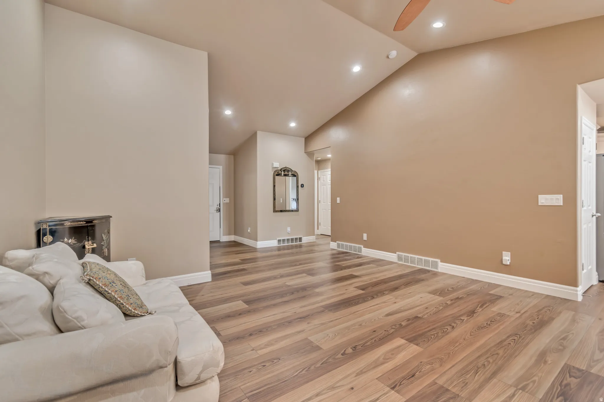 Another living room photo, as seen from dining room and kitchen.