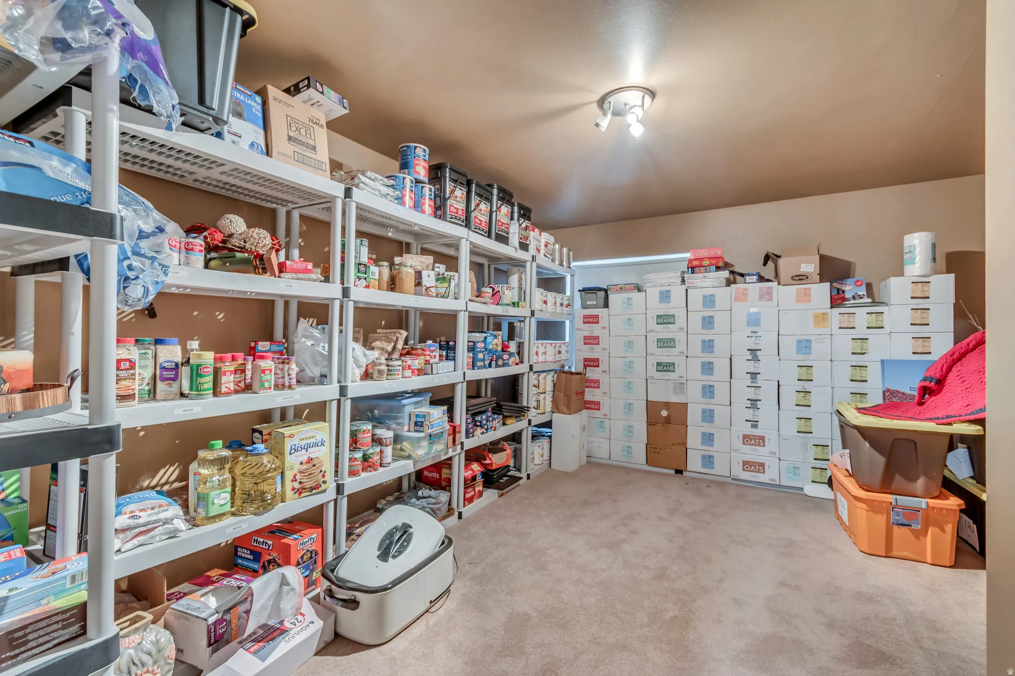 This space in currently used as a the world's nicest food storage room! However, it can also be used as another bedroom, with plenty of closet space.
