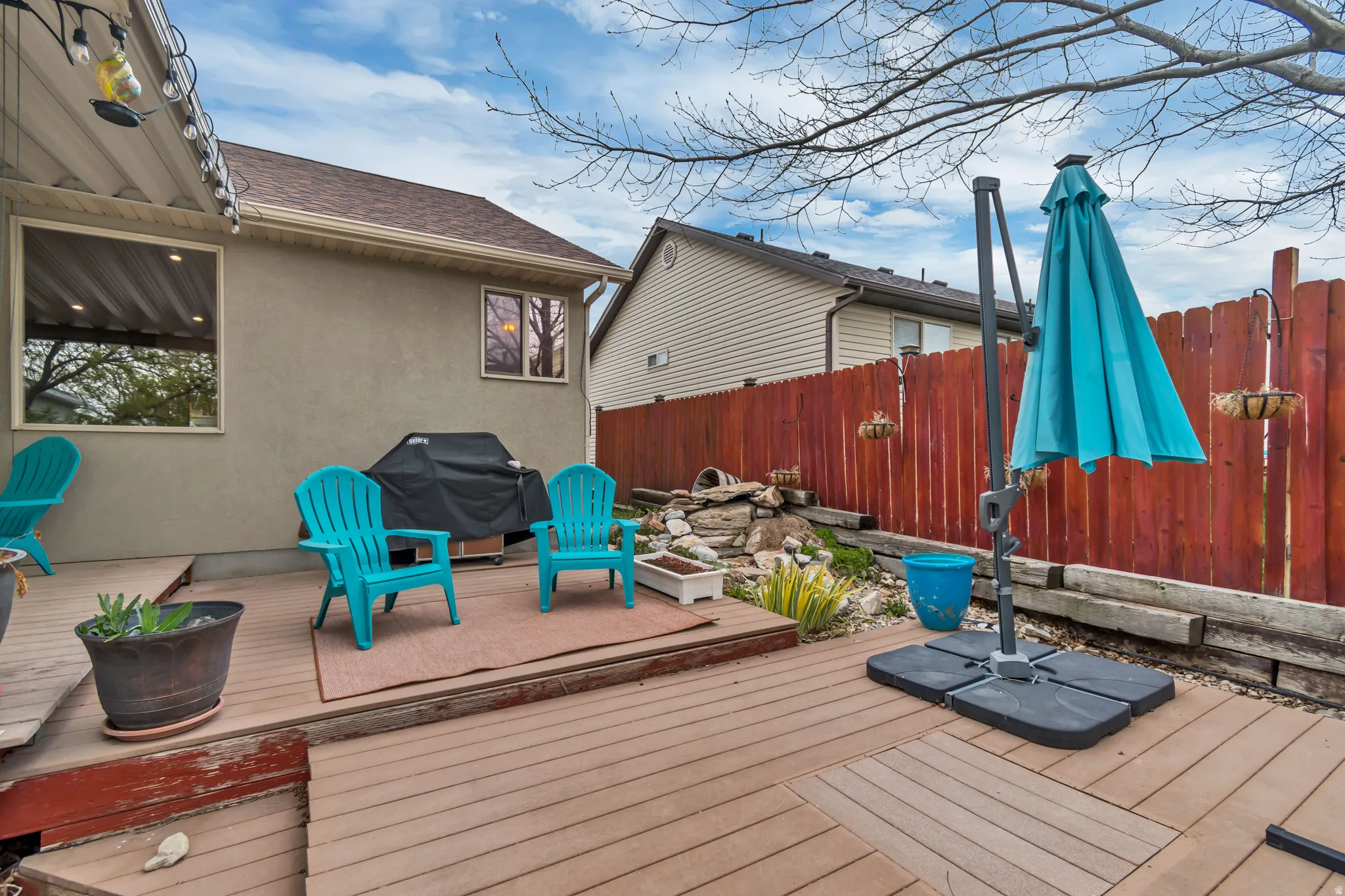 Another angle of back patio.   There is a recirculating waterfall feature in the upper right corner.   This greatly adds more tranquility to this space.