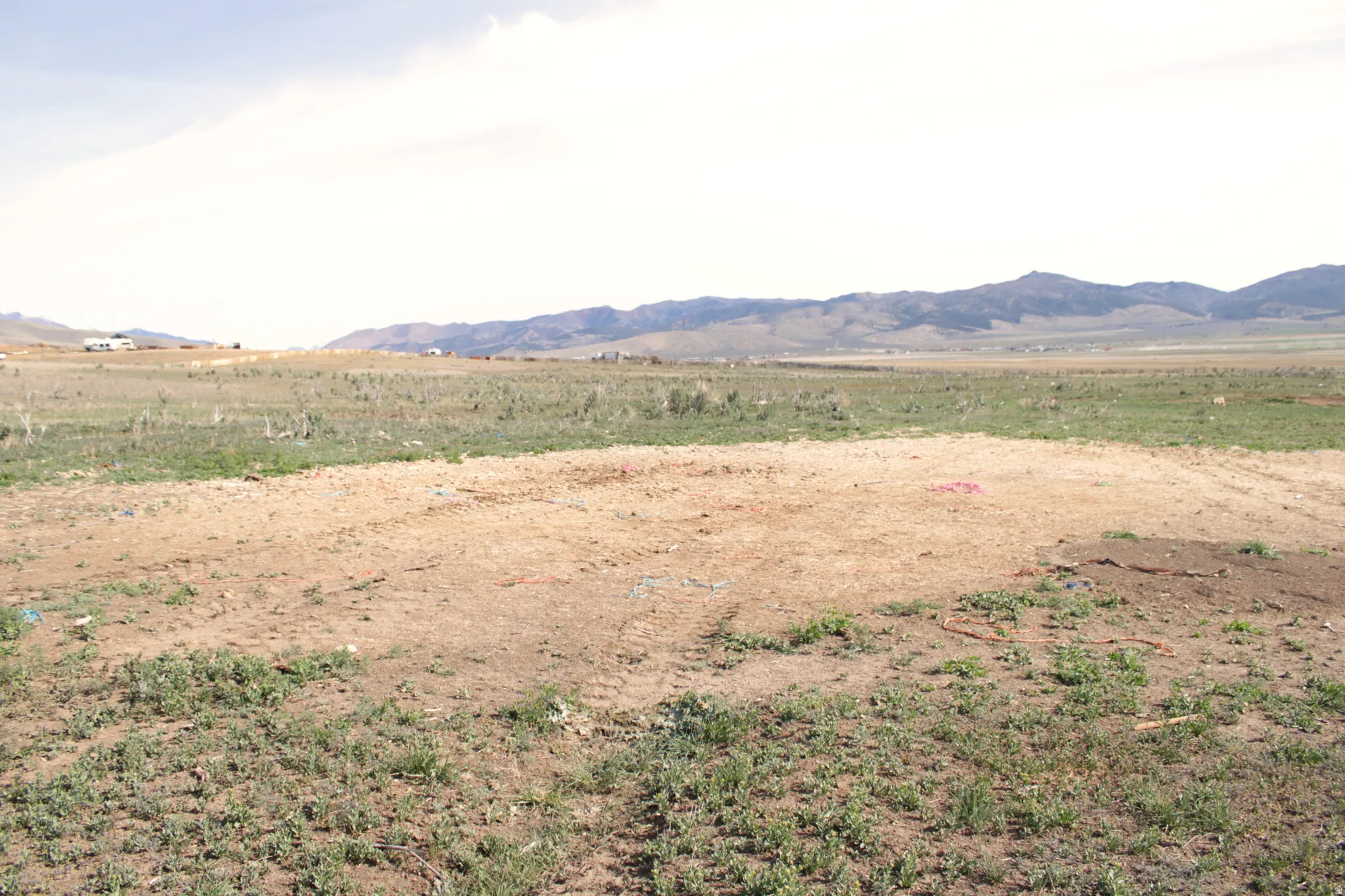 View of mountain background featuring rural landscape