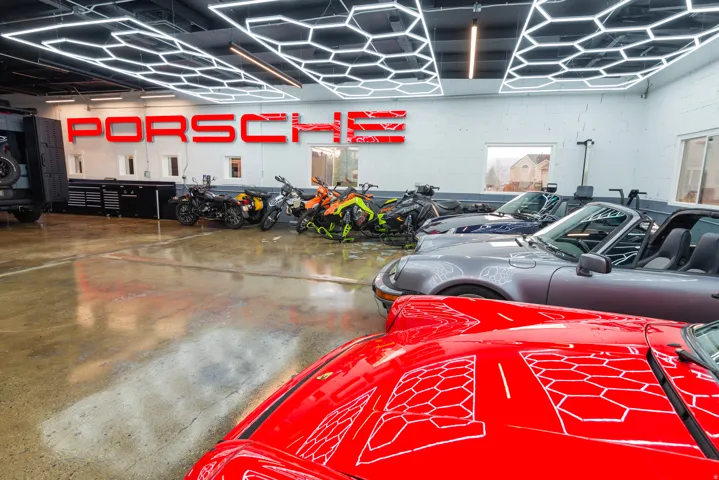 Garage featuring concrete block wall