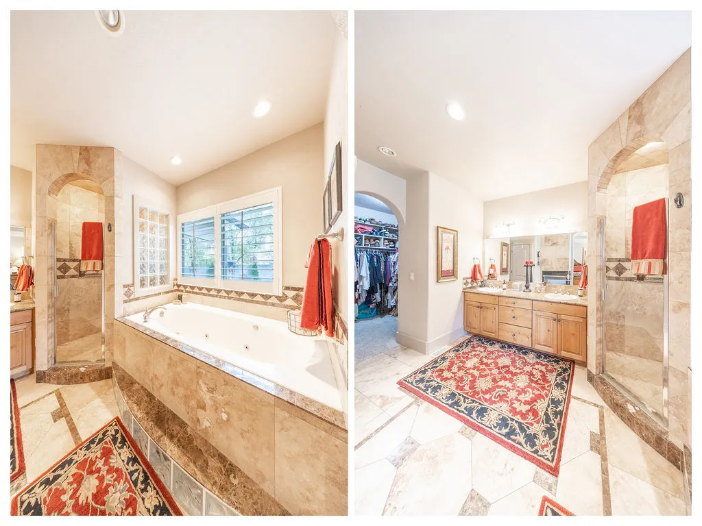 Bathroom featuring a walk in shower, double vanity, a spacious closet, a whirlpool tub, and inlaid floor details