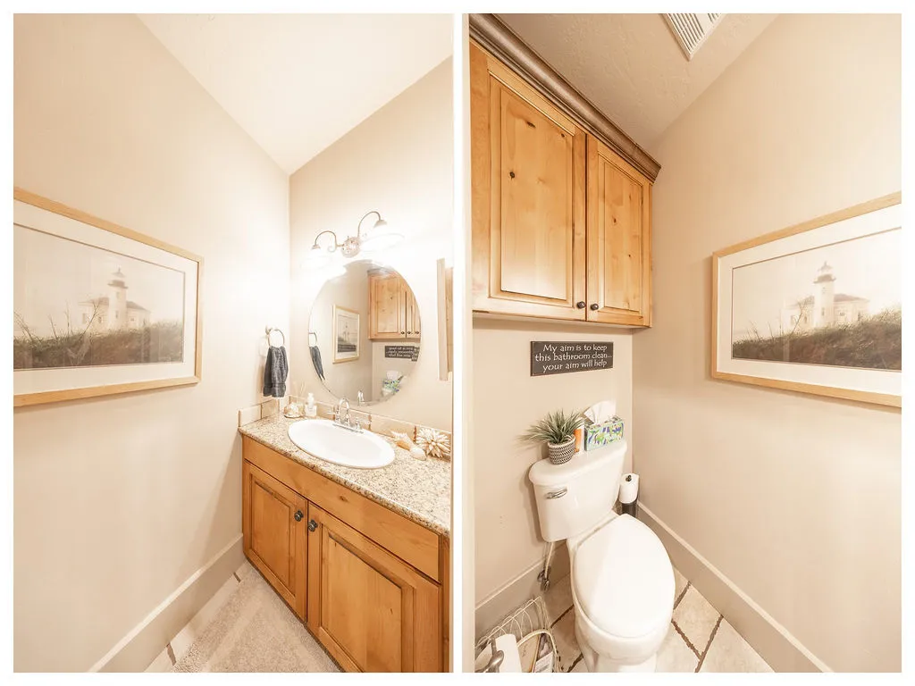 Bathroom featuring vanity, vaulted ceiling, and light tile patterned floors