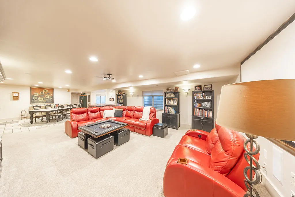Living area featuring recessed lighting and carpet flooring