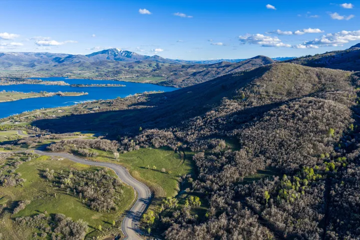 View of mountain background featuring a large body of water