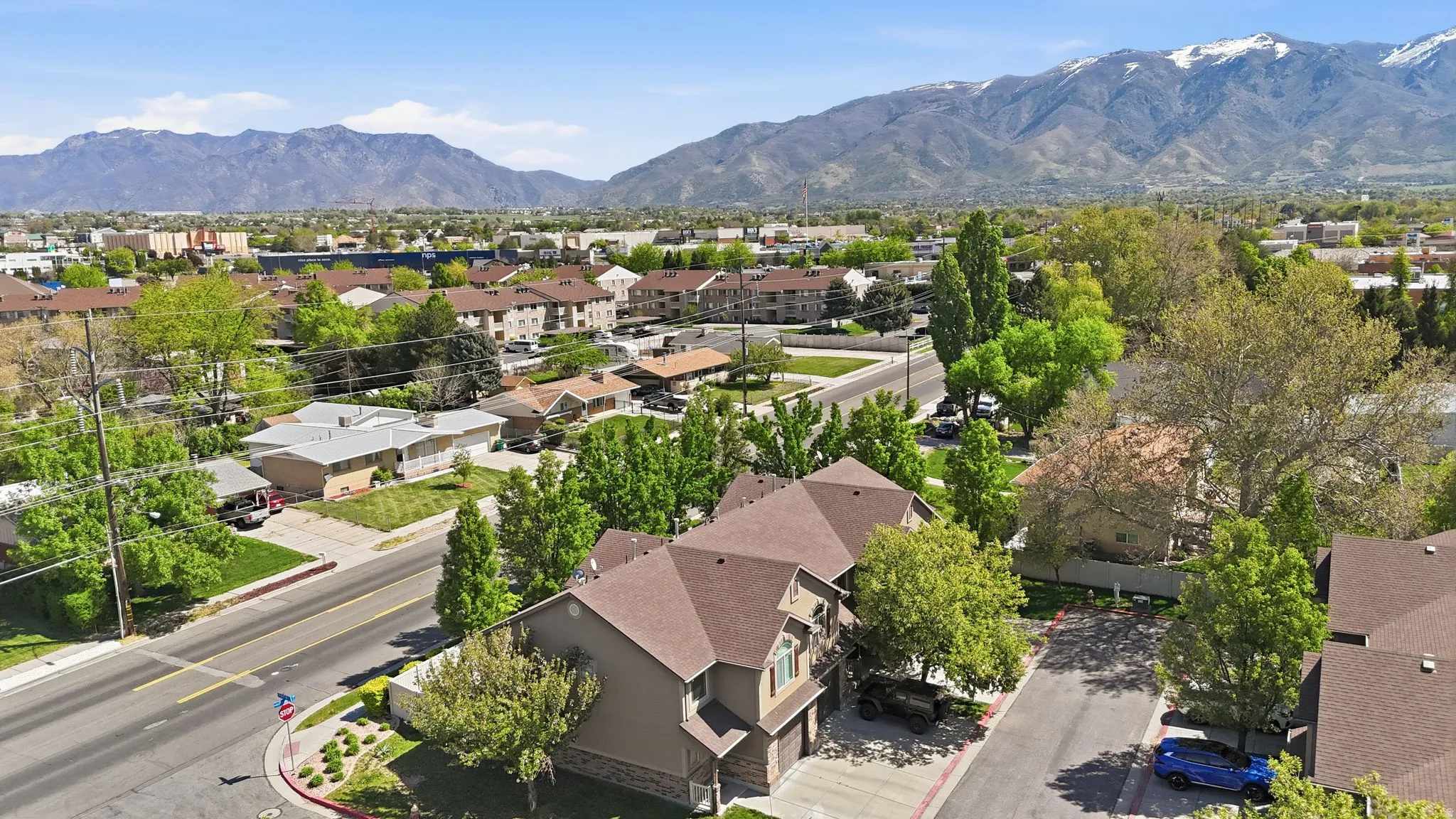 Aerial view of residential area with mountains