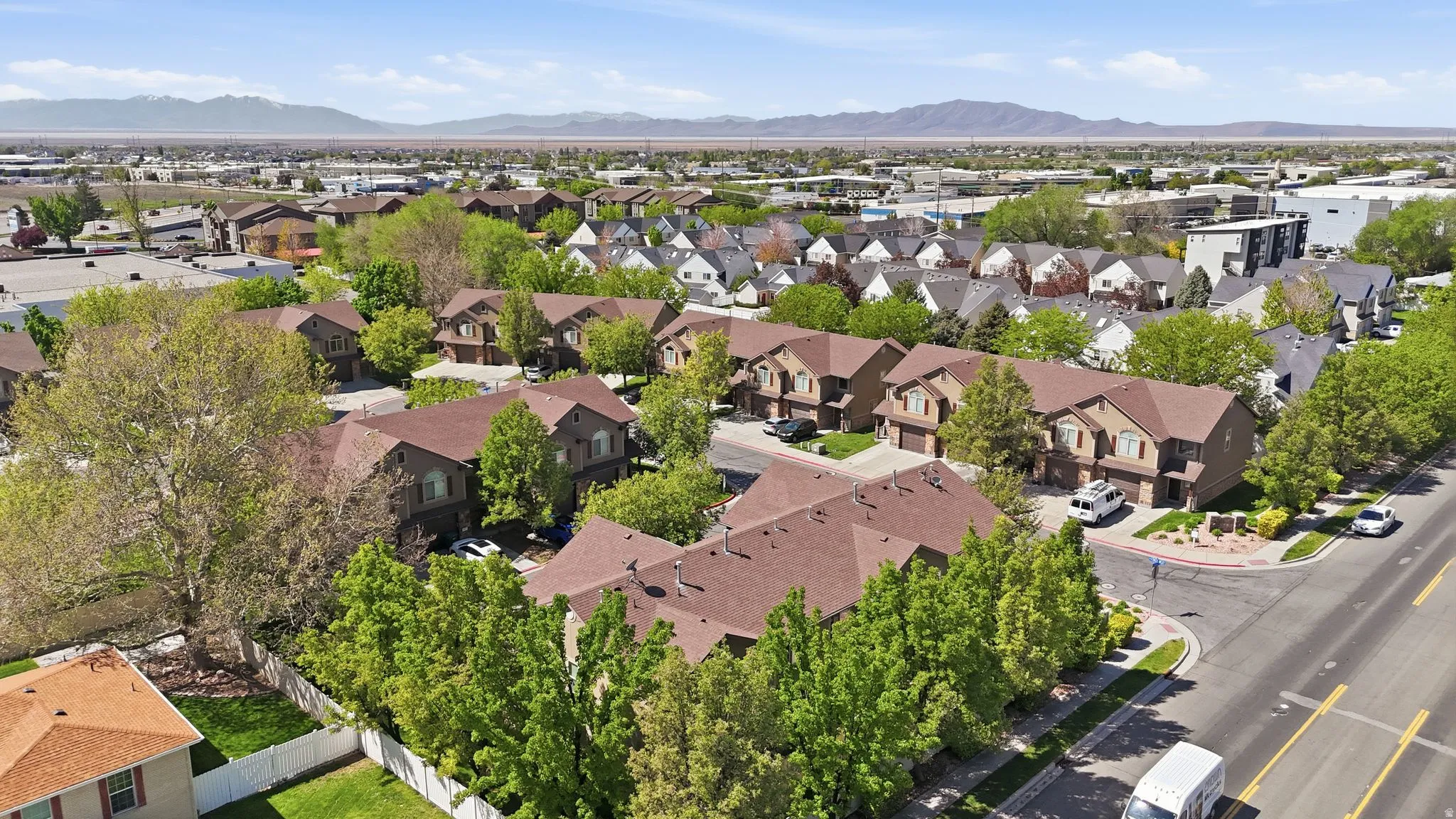 Aerial perspective of suburban area with mountains