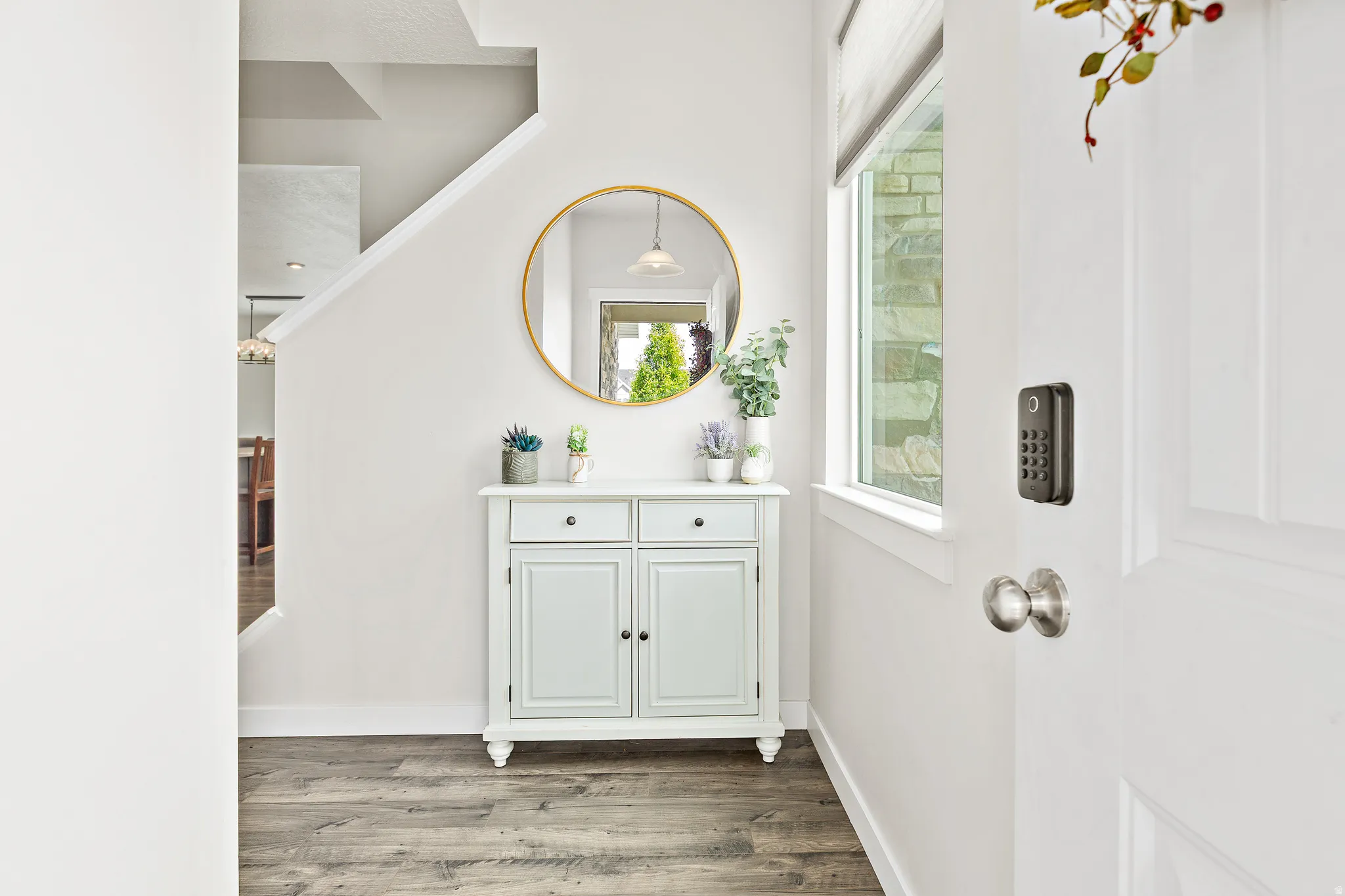 Bathroom featuring vanity and light wood-style flooring