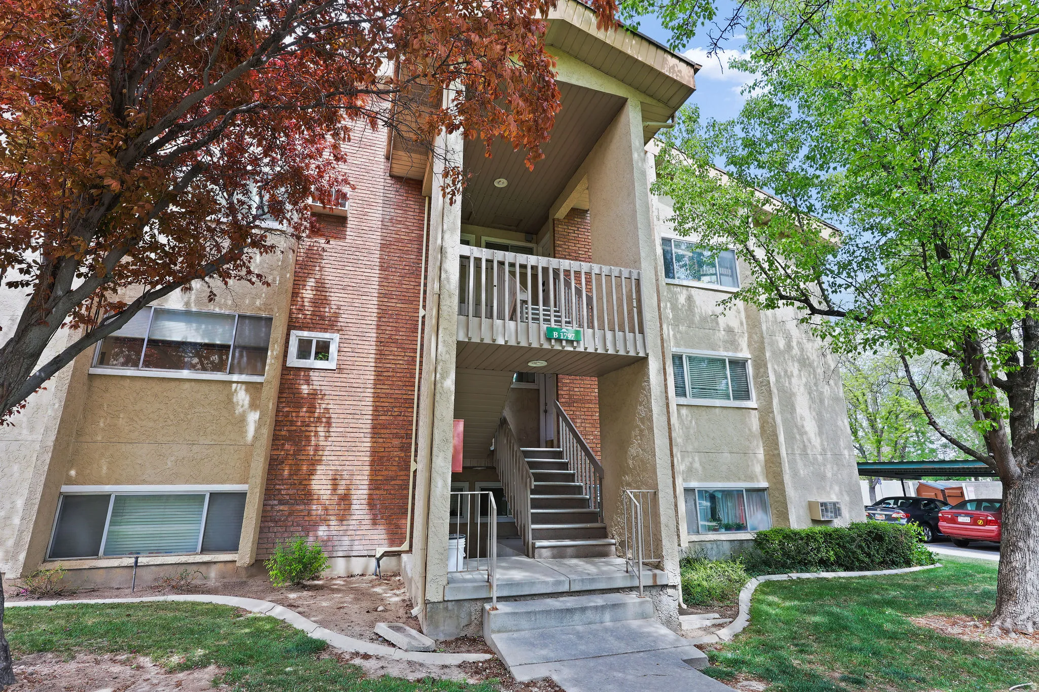 View of apartment building / complex with stairway