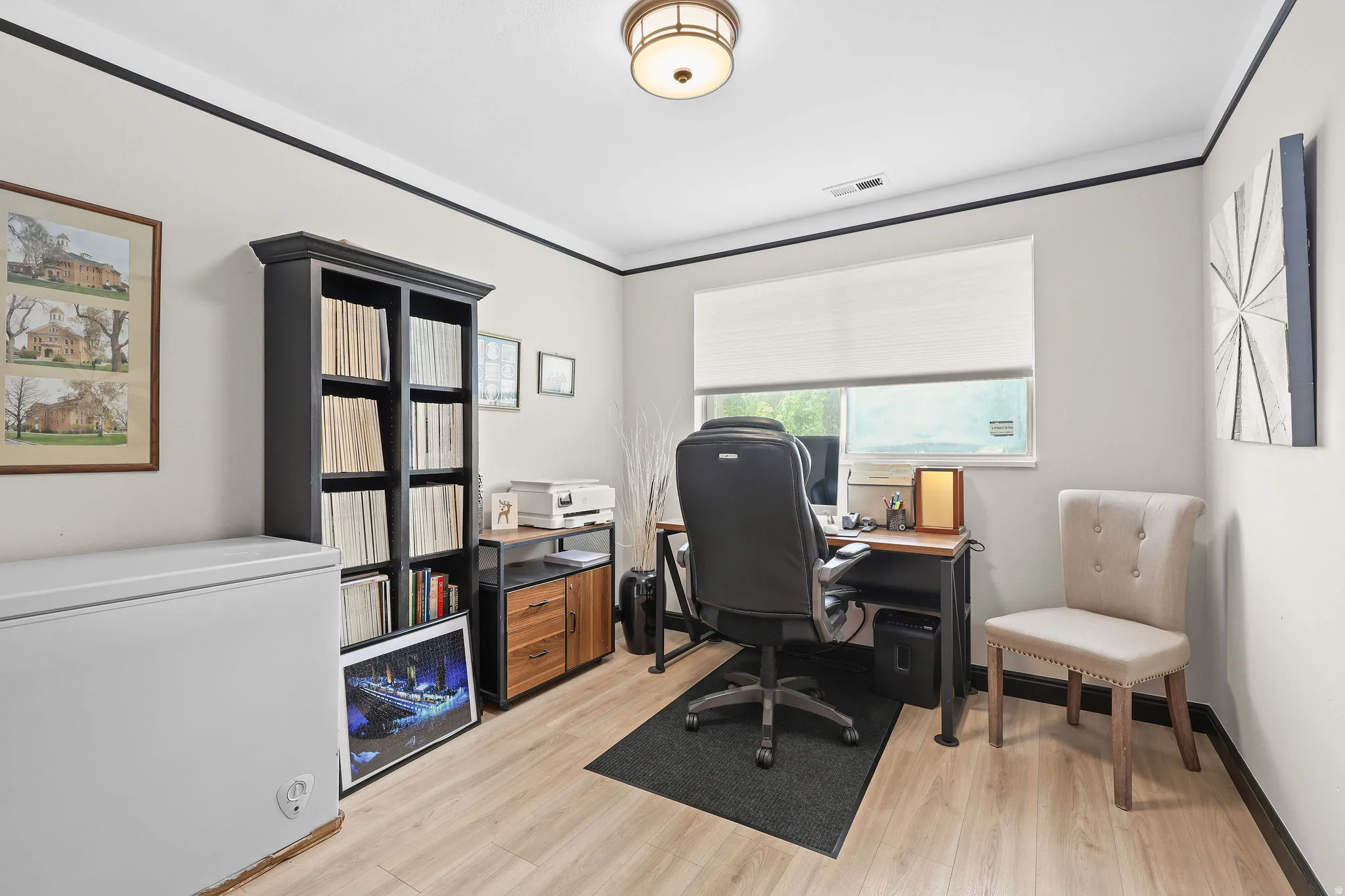 Office featuring light wood-style floors