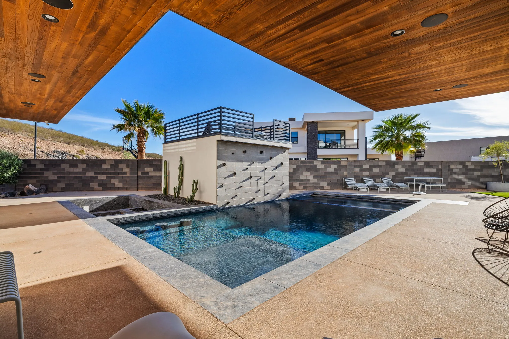 View of swimming pool with patio surround