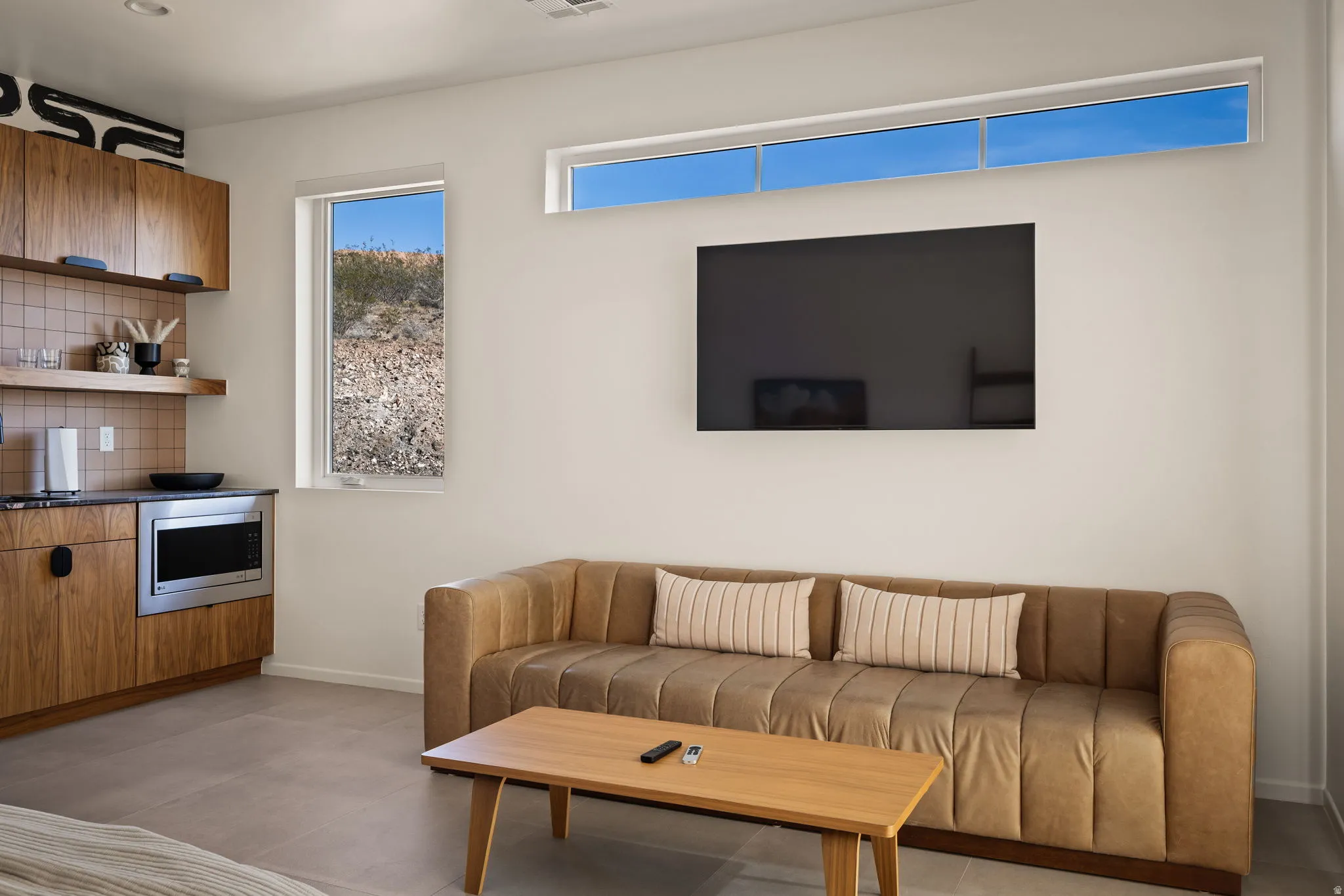 Living area featuring baseboards