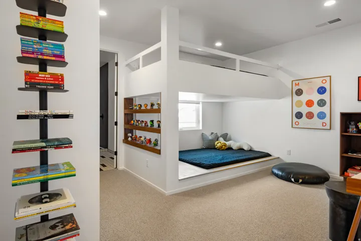 Bedroom featuring light carpet and recessed lighting