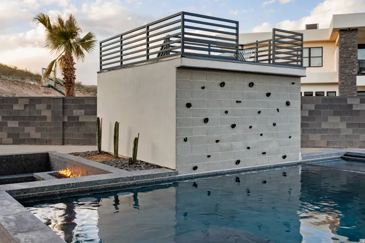View of pool featuring an outdoor fire pit