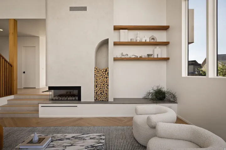 Living area featuring parquet flooring and a multi sided fireplace