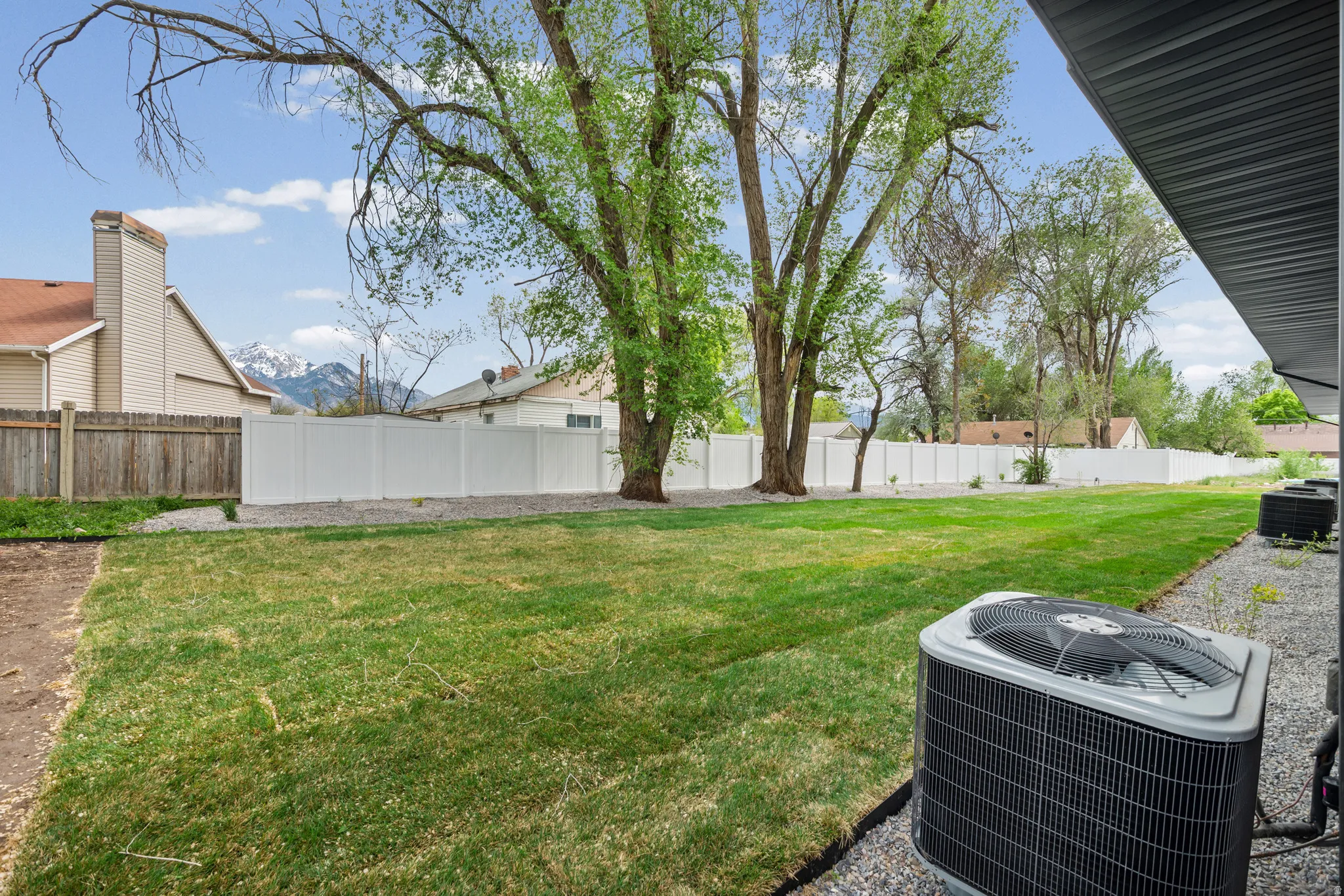 Fenced backyard featuring a patio