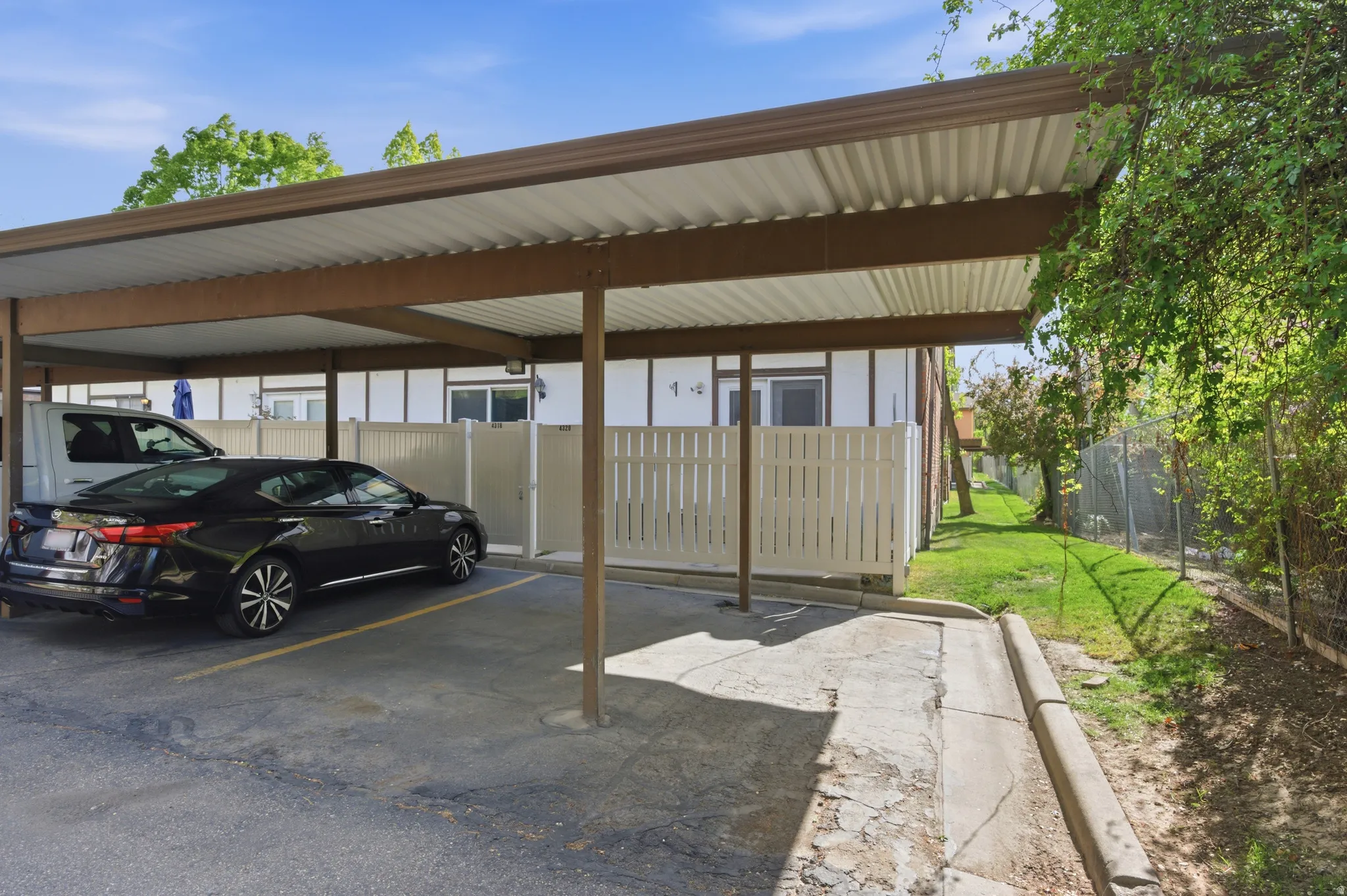 View of 2 covered parking spots