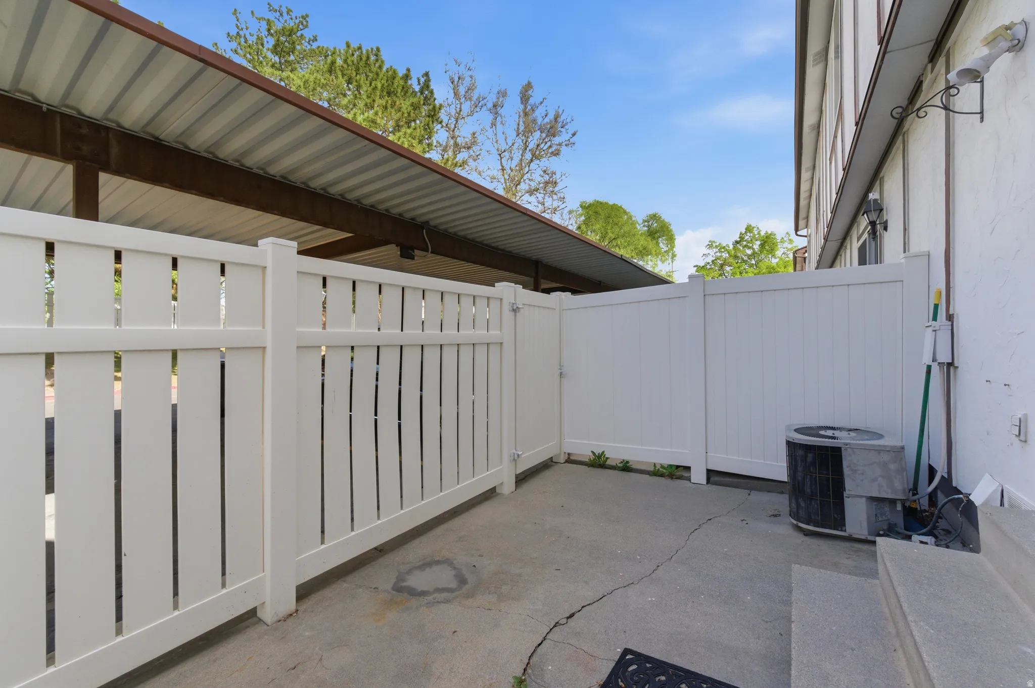 View of patio / terrace with a gate
