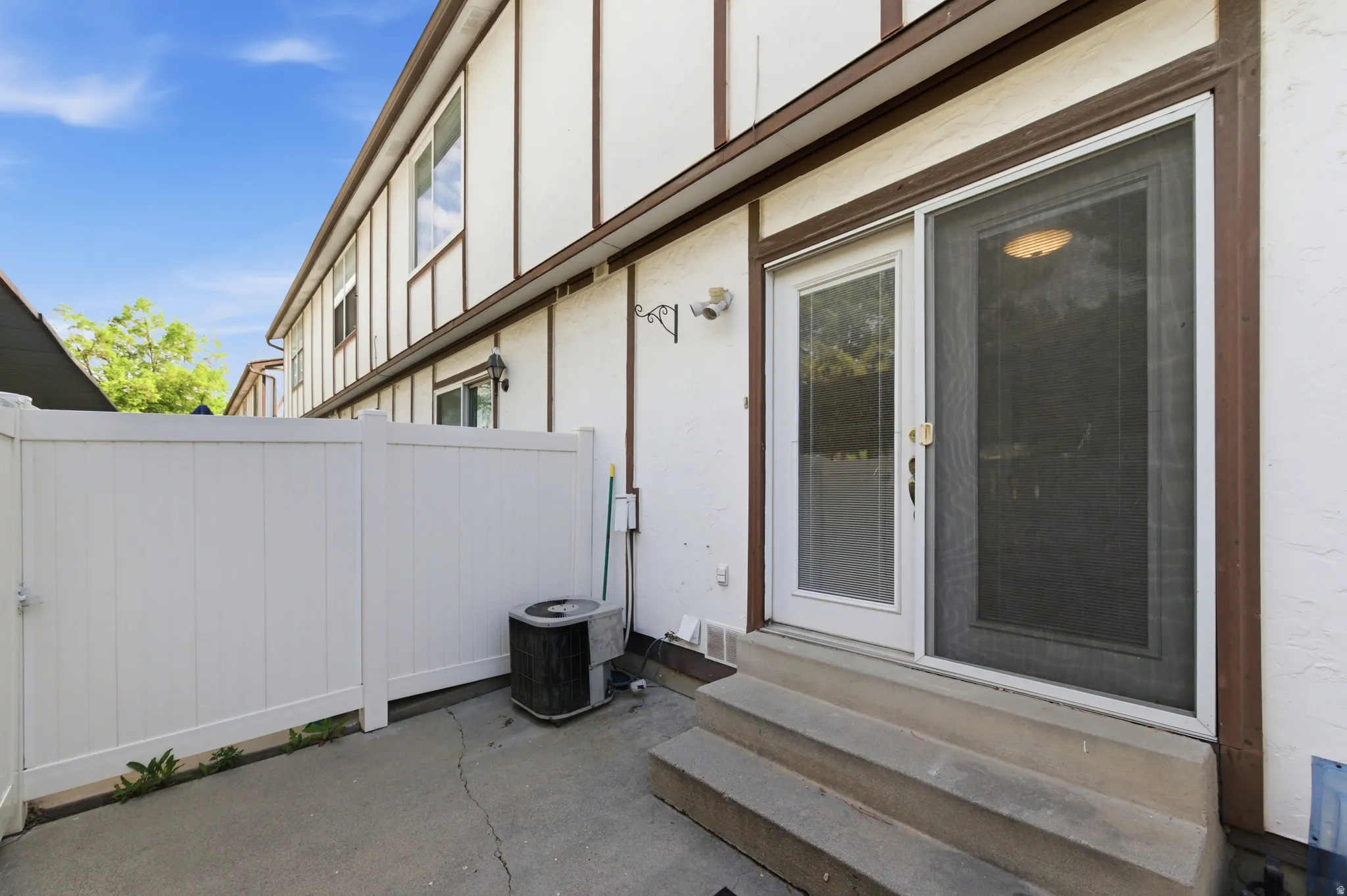 View of patio with entry steps