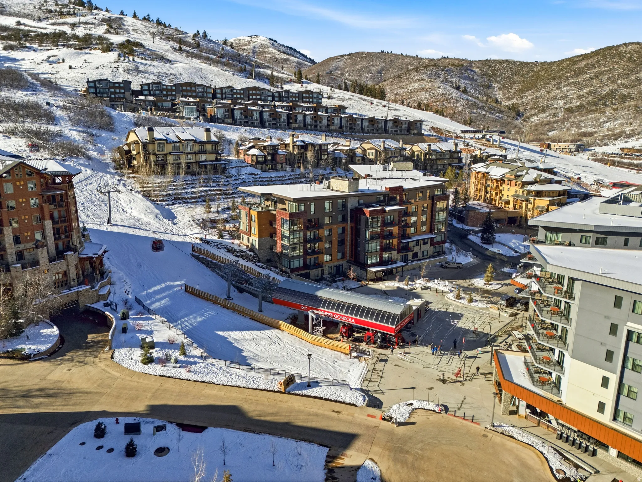 Snowy aerial view with a mountain view
