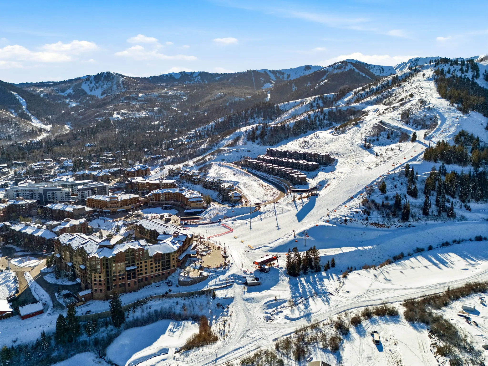 Snowy aerial view featuring a mountain view