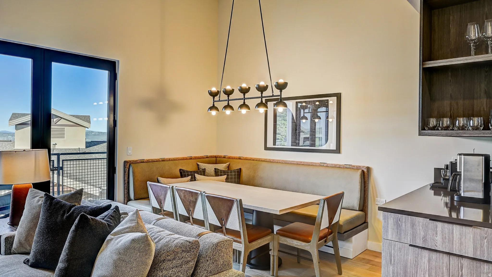 Dining room with breakfast area and light wood-style flooring