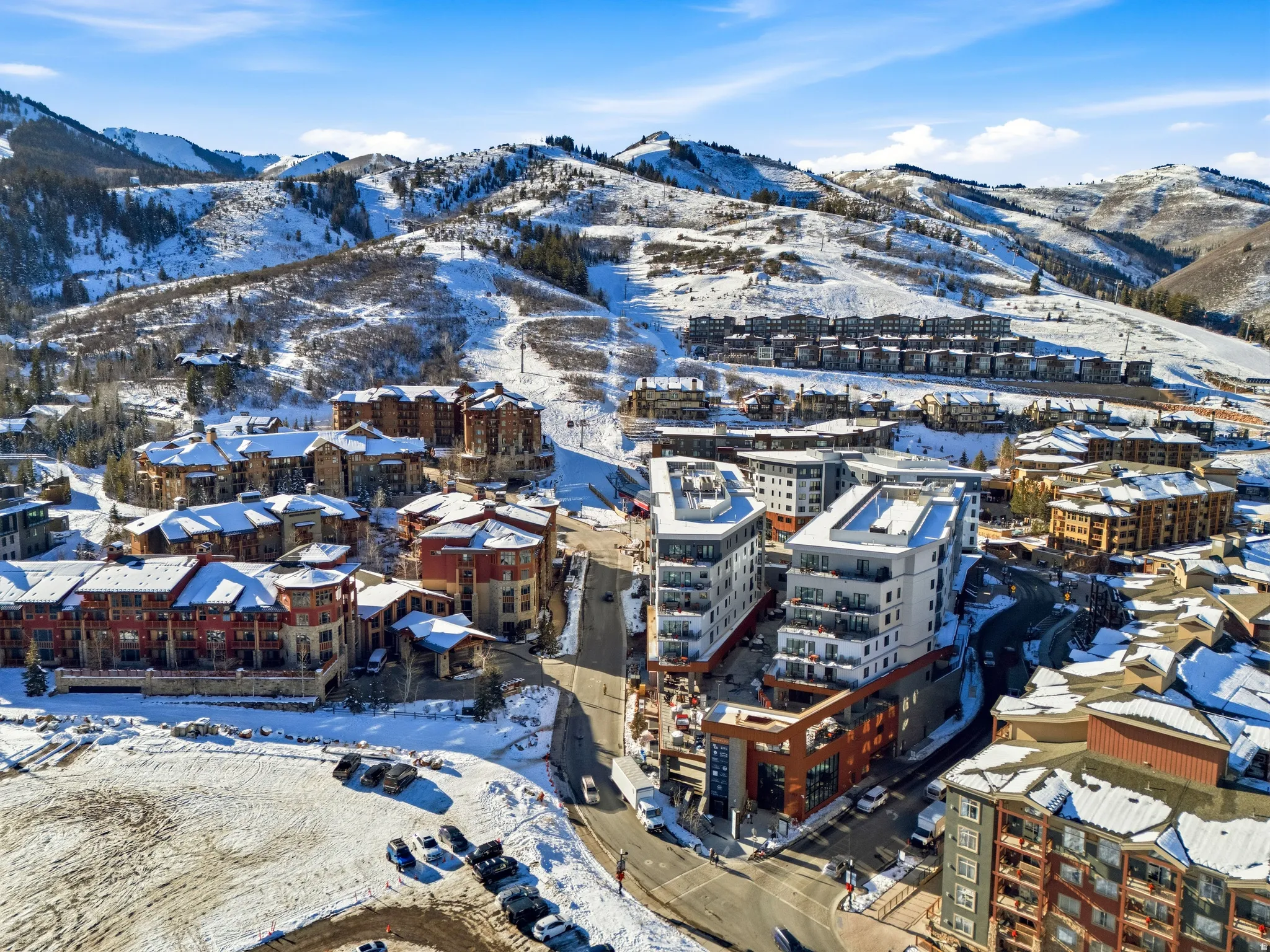 Snowy aerial view featuring a mountain view