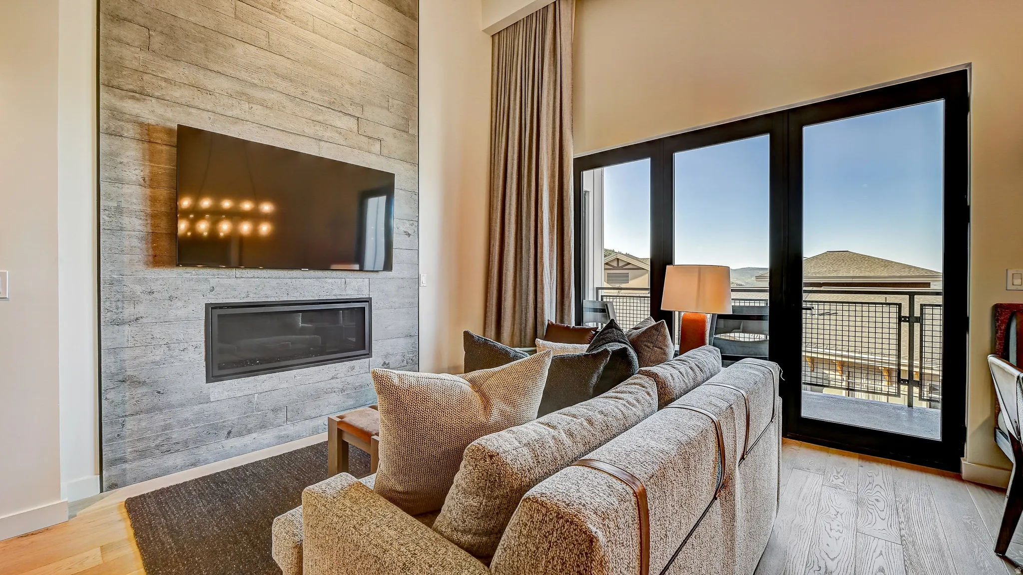 Living area featuring a fireplace and light wood-style flooring