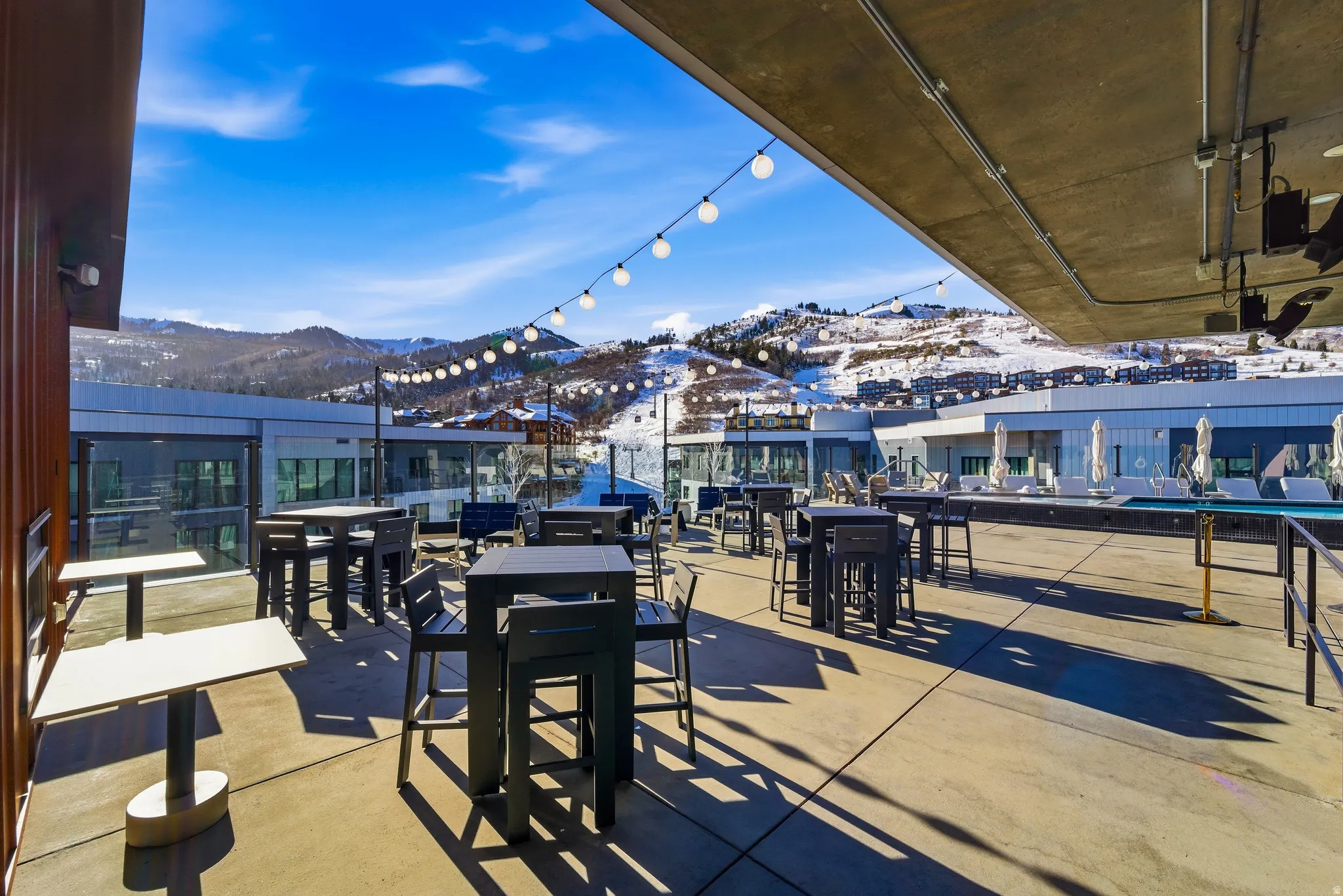 View of patio / terrace with a mountain view and outdoor dining area