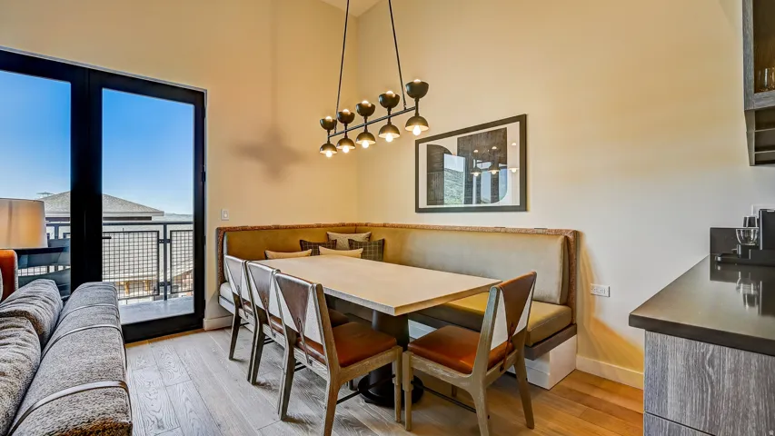 Dining area featuring light wood finished floors and baseboards