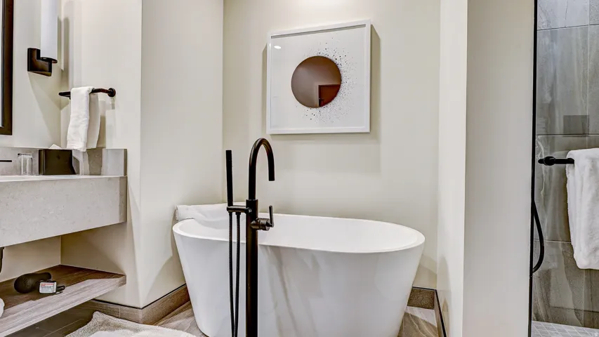 Bathroom featuring a freestanding bath and vanity