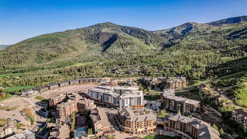 Aerial overview of property's location with a mountain backdrop