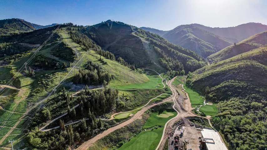 Mountain view featuring a local golf course