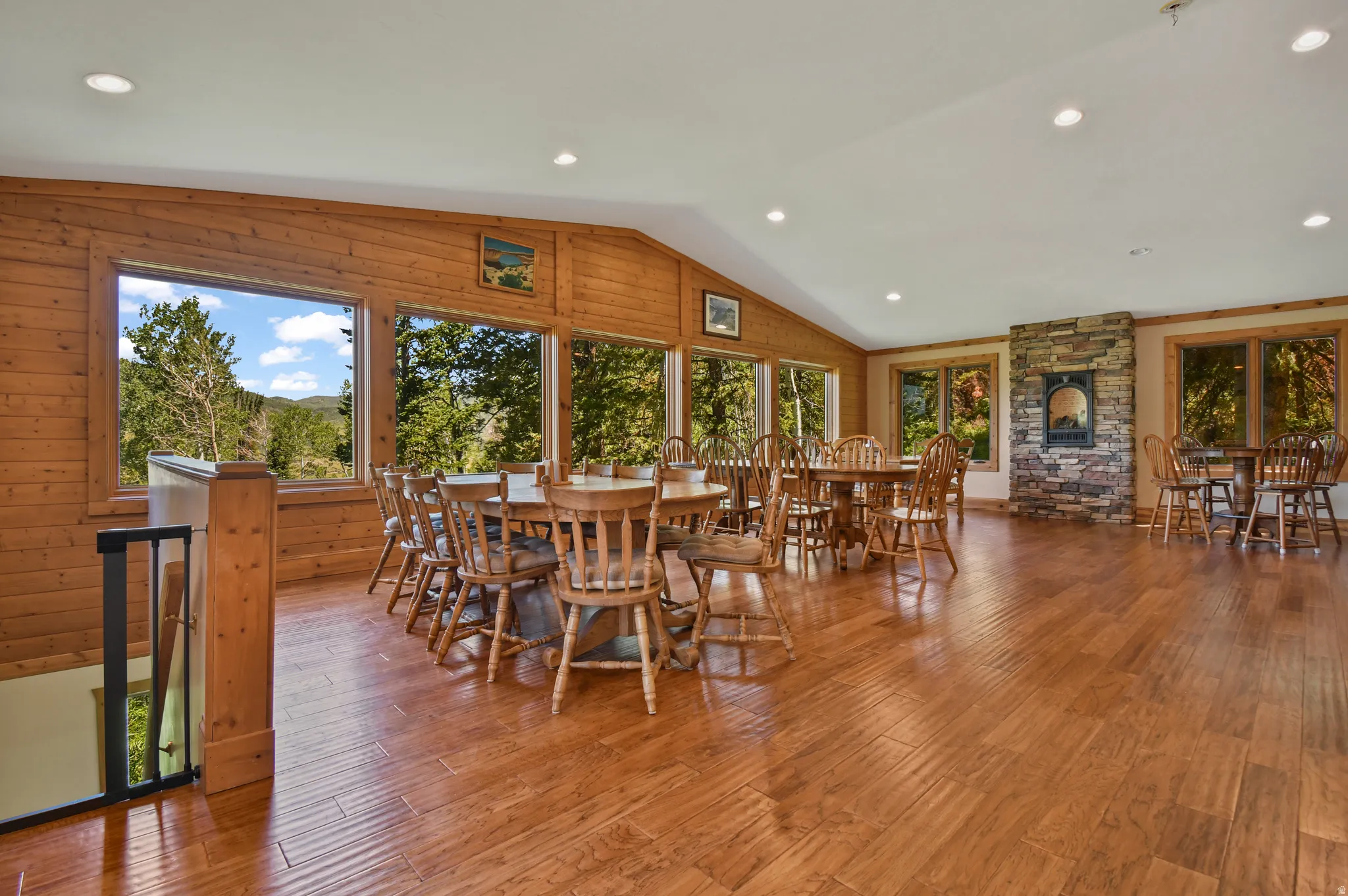Dining room with recessed lighting and hardwood / wood-style flooring