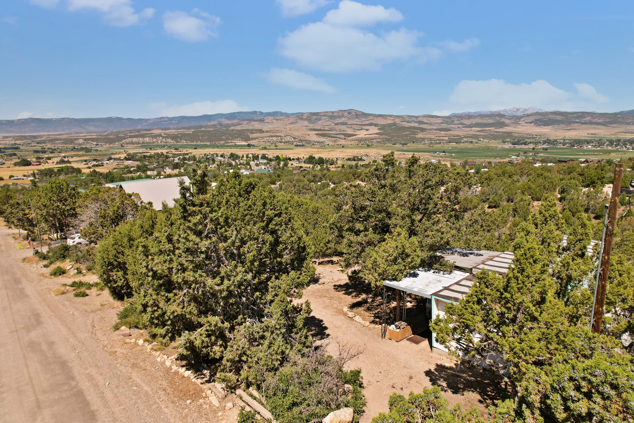 Drone / aerial view of a mountain backdrop