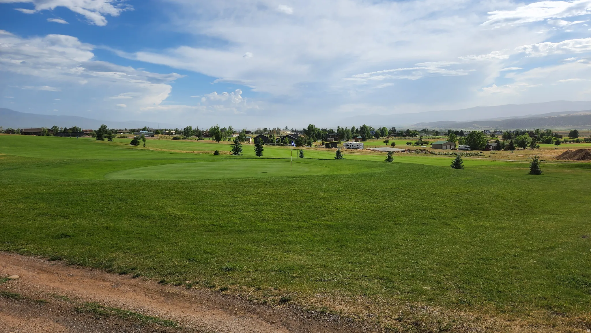 View of community featuring a mountain view and golf course view