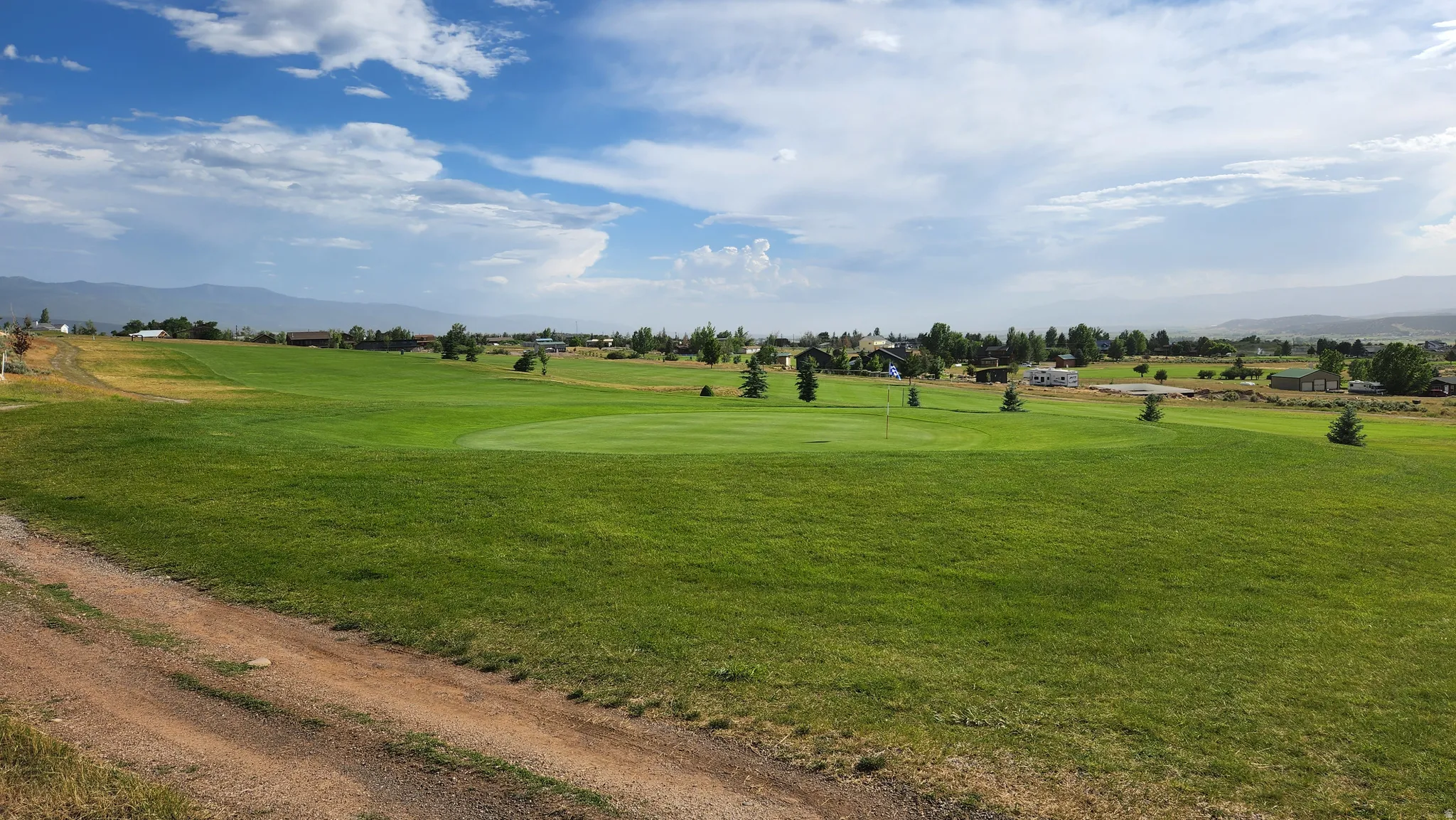 View of community with a mountain view and golf course view