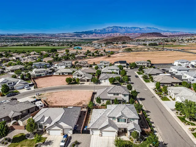 Aerial view of residential area with a mountainous background