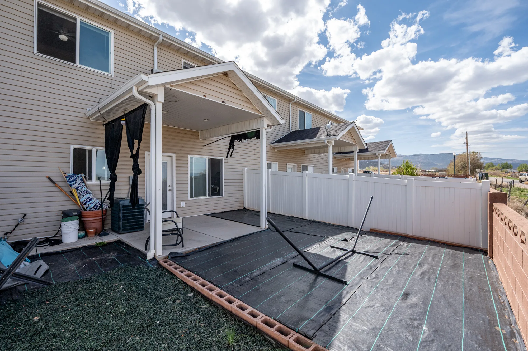 Covered patio offering outdoor living space
