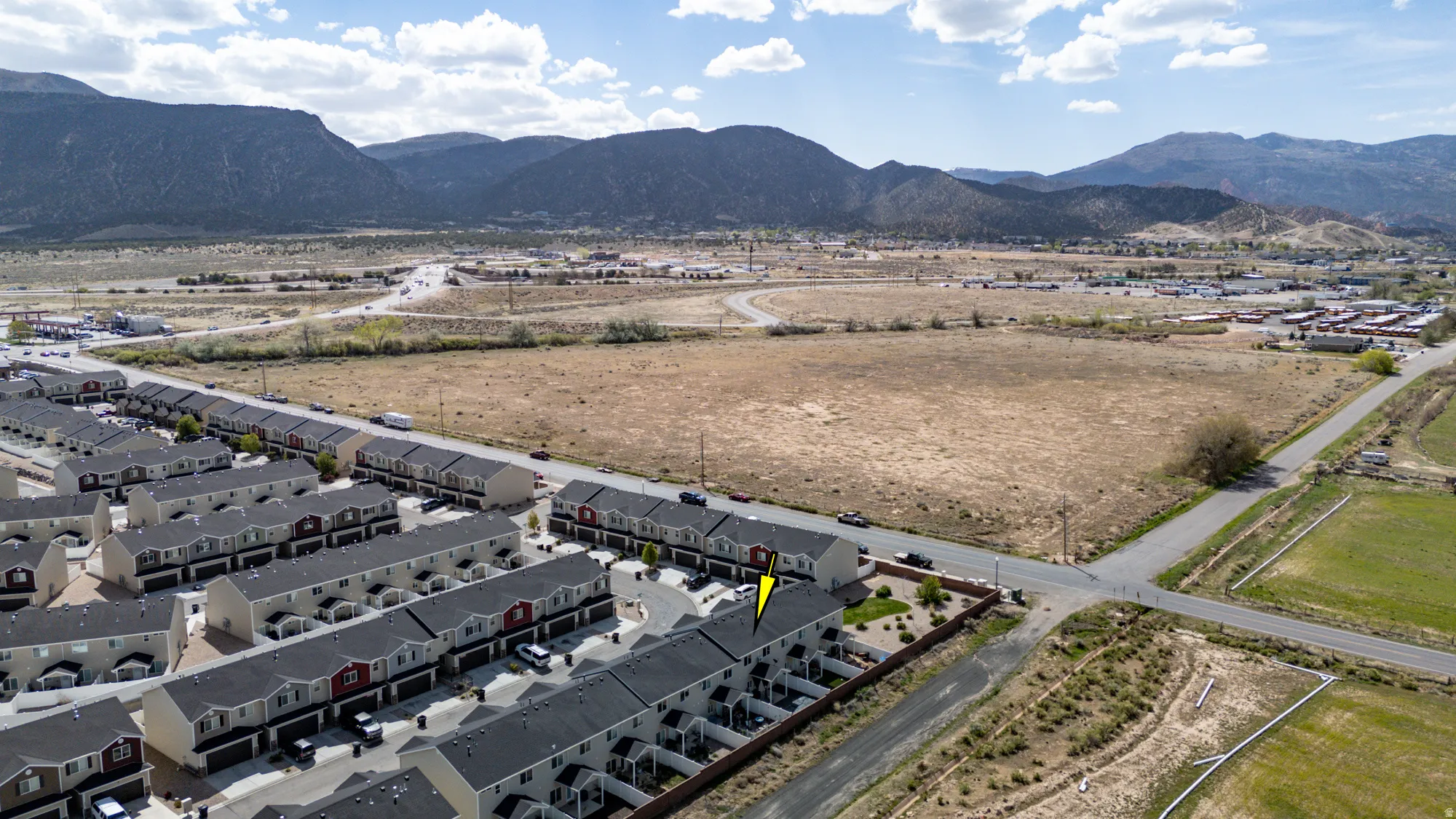 Aerial perspective of suburban area featuring mountains