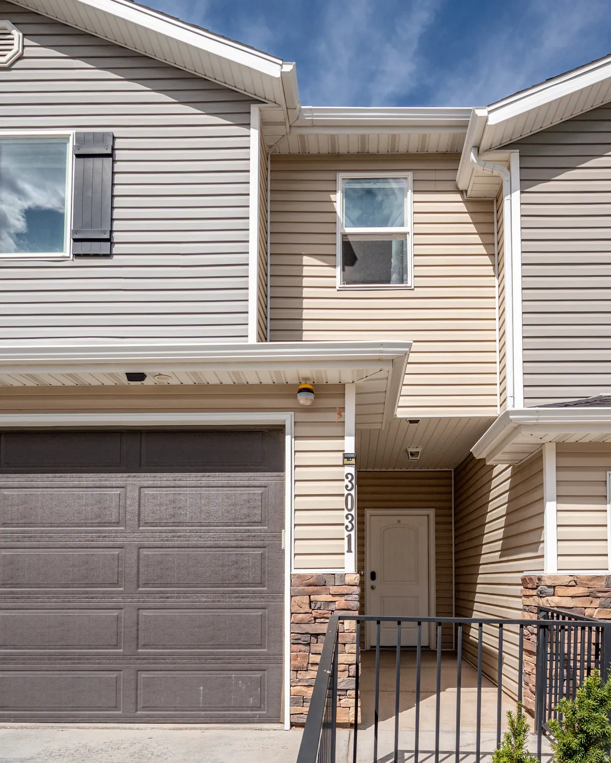 View of front of home featuring a garage