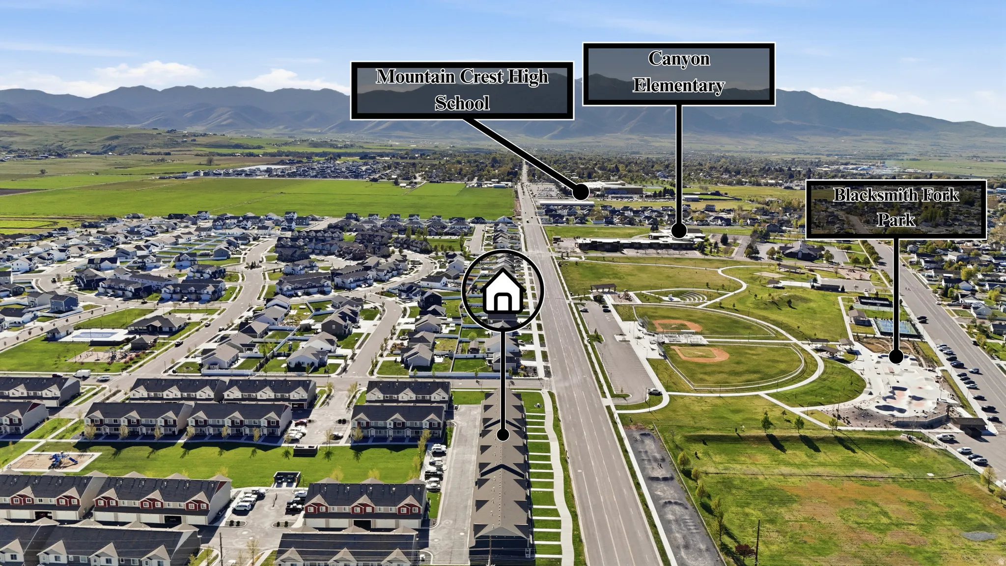 View of property location with mountains and nearby suburban area