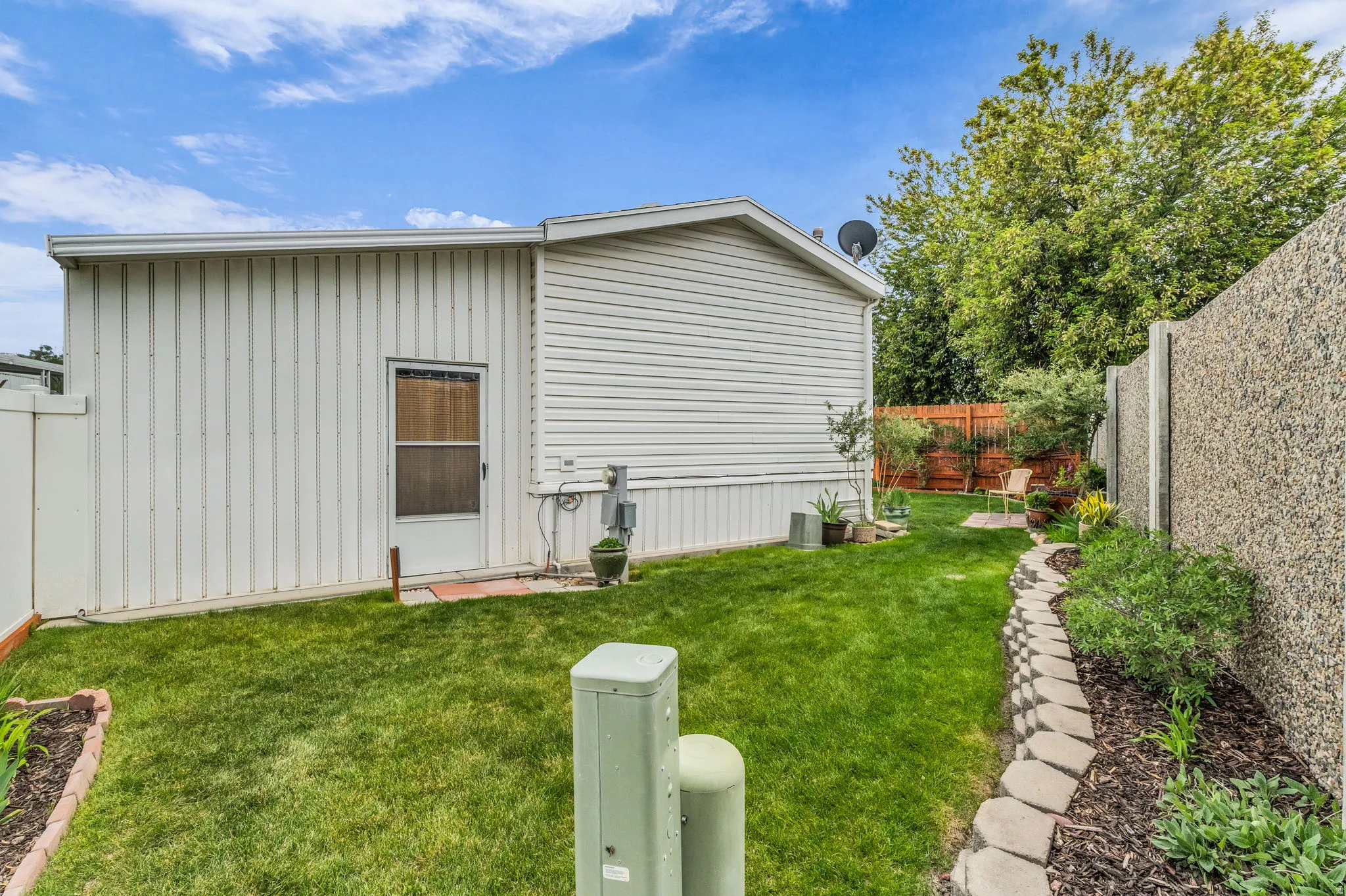 View of outdoor structure with a fenced backyard
